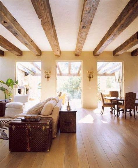 Cozy Living Room Designs With Exposed Wooden Beams 34 554x678