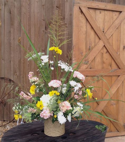 Rustic Wedding Flowers With Assorted Grasses And Wild Flowers In Rope