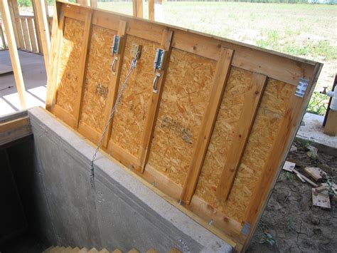 Get storm doors fitted to make your home energy efficient and also save on air conditioning and heating bills. Storm cellar door wood | Decor | Pinterest