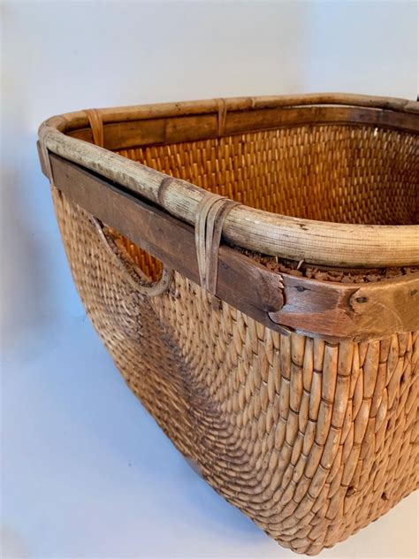 They're soft to the touch, with a fresh look that works with modern or classic. Handwoven Cane and Rattan Basket at 1stdibs