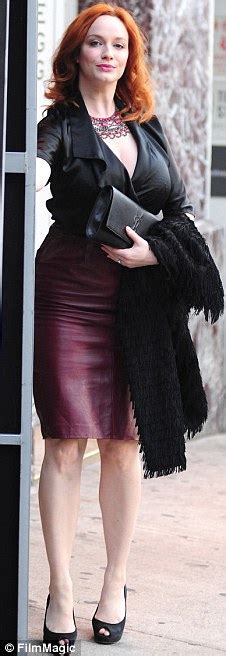 Christina Hendricks Works A Leather Skirt And Plunging Neckline To