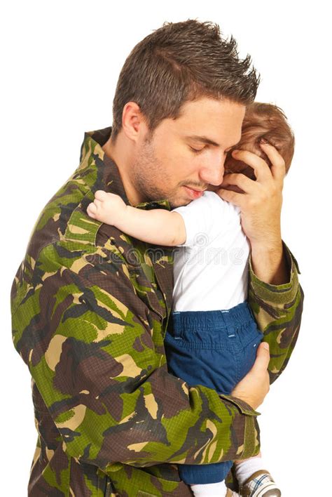 Military Father Embracing His Baby Son Stock Photos