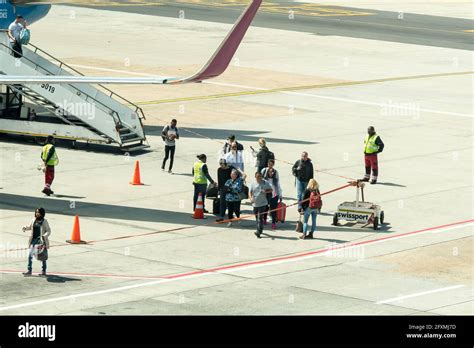 Passengers Walking On Tarmac Hi Res Stock Photography And Images Alamy