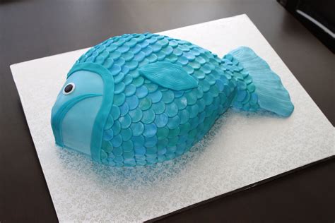 Fishing birthday cake with fish and fishing pole with a lake on the cake, and for adults and children. Fish Shaped Cake | Buttercream & Bacon | Fish cake ...