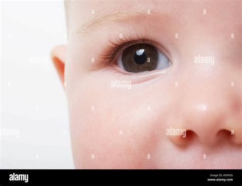 Close Up Baby Girl Looking Sideways Hi Res Stock Photography And Images