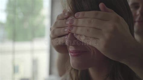 Man Closes His Is Girlfriend`s Eyes To Make Surprise Stock Footage Video Of Beautiful Females