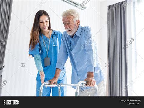 Caregiver Nurse Take Image And Photo Free Trial Bigstock
