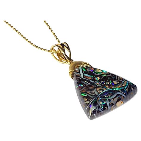 Kt Gold Pendant With Yellow Diamond Boulder Opal And Pink And Teal