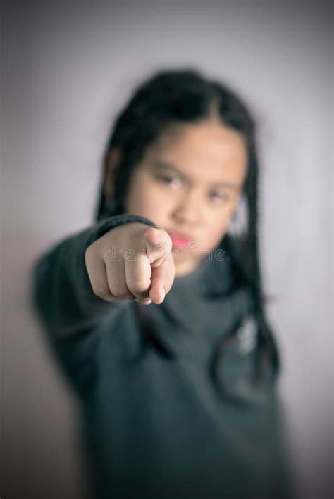 Happy Cute Little Asian Girl Pointing With Her Finger Stock Image Image Of Beautiful Asian