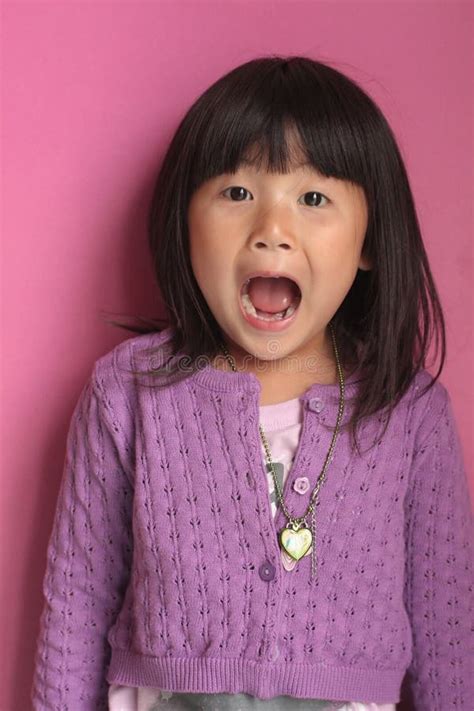 Little Asian Chinese Girl With Sad Face Stock Image Image Of Purple Backround 18248309