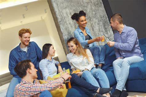 Group Of Friends Having Party Indoors Fun Together Talking Stock Photo