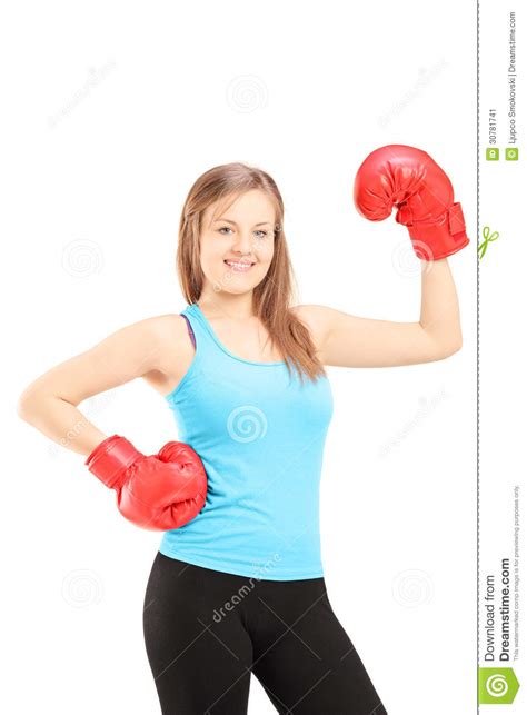 Smiling Female Athlete Wearing Red Boxing Gloves And Posing Stock Image