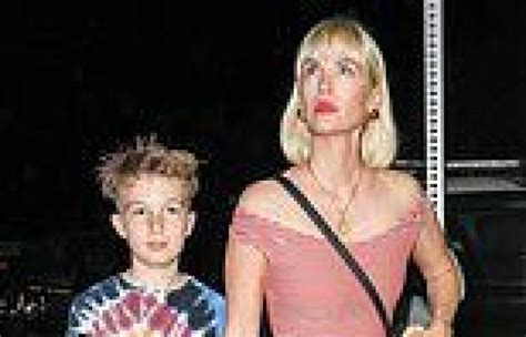 Sunday 4 September 2022 0949 Am January Jones Dons A Red Striped Crop Top In Outing With Son