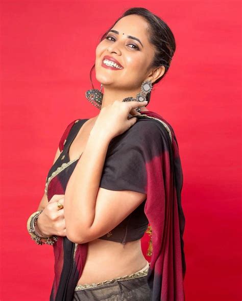 Anasuya Bharadwaj In Transparent Red Saree Hot Photos Gallery Looking