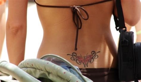 70 Tattoos Auf Dem Unteren Rücken Für Frauen