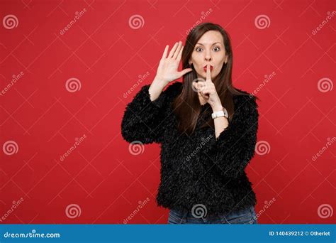 Young Woman Saying Hush Be Quiet With Finger On Lips Shhh Gesture