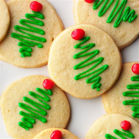 The cookies are flattened with a glass dipped in granulated sugar. Holiday Sugar Cookies Recipe | Taste of Home