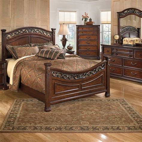 Ring pull hardware in an antique brass color, accented with white paint hang up. Signature Design by Ashley® Leahlyn Bed | Bedroom sets ...