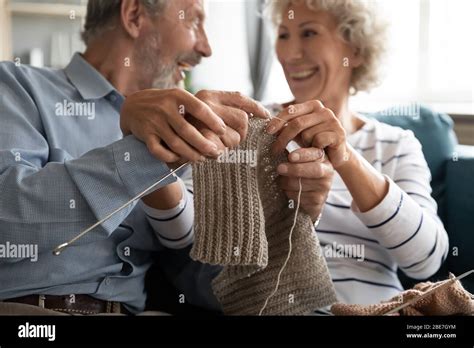 Caring Loving Older Wife Teaching Husband Knitting Close Up Stock Photo Alamy