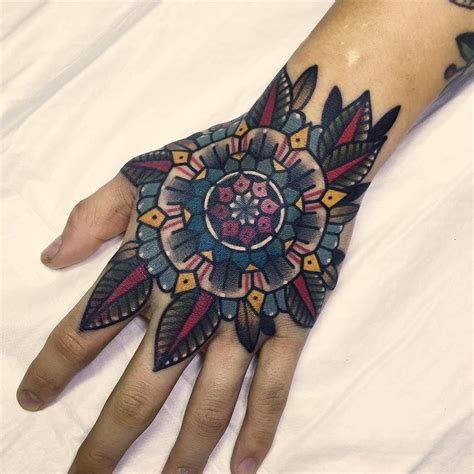 The designs look great whether expressed in bright colors, black and white or the vivid water color pieces. Color Hand Mandala | Best tattoo design ideas