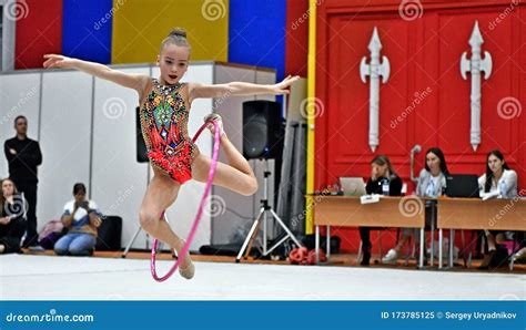 Children`s Rhythmic Gymnastics Competition Adorable Sporty Little Girl