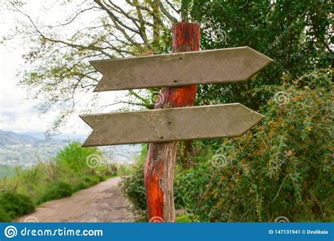 Wooden Arrow Direction Sign Stock Image - Image of empty, place: 147131941