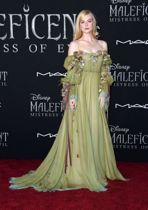 Elle Fanning Channels Princess Aurora At Maleficent Mistress Of Evil Premiere Exclusive
