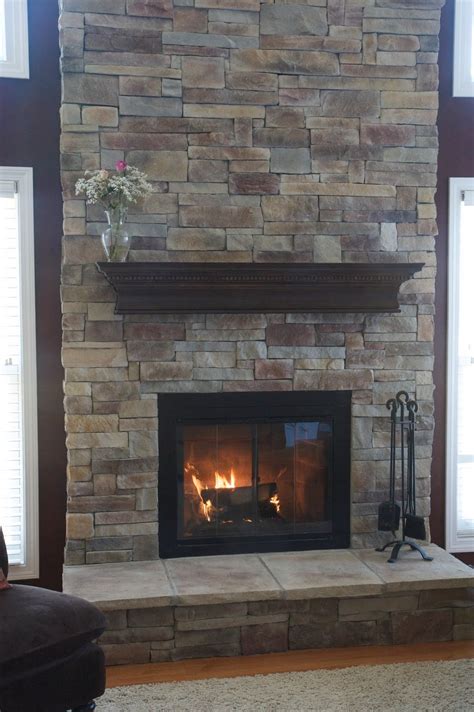 The black and white color of the stone gives you a lot of freedom to introduce other colors into the room's design, while at the same time setting the stage for the room's style. Stone Fireplace Mantels with Chimney - Traba Homes