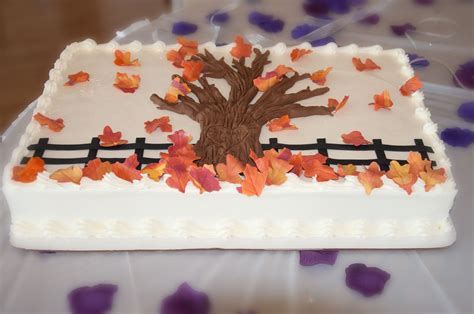 Set cake stand on a cookie sheet. fall wedding sheet cake with a carved heart with names on ...
