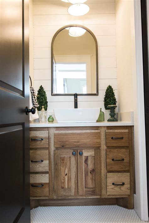 Bathroom Inspiration With White Shiplap And Light Stained Wood Cabinets