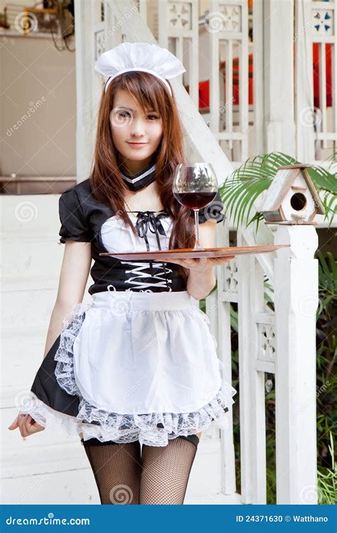Asian Waitress Staff Wearing Protection Face Mask In Apron Cleaning