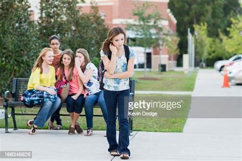 Girl Being Teased By Other Girls Photo Getty Images