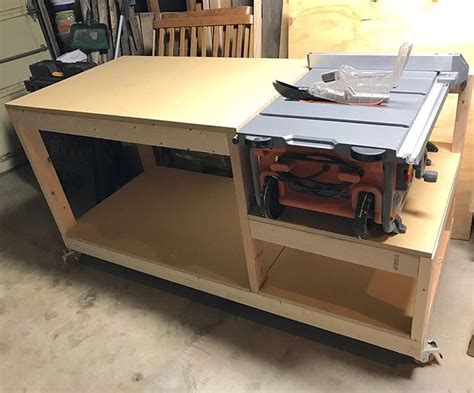 A Workbench With Tools On It In A Garage