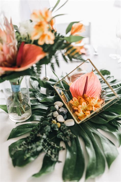 Hilton Head Weddings Tropical Centerpieces With Proteas Palm Leaves