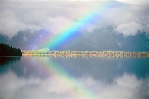 Rainbow Over Lake In Cloudy Day Lake Photograph By Panoramic Images