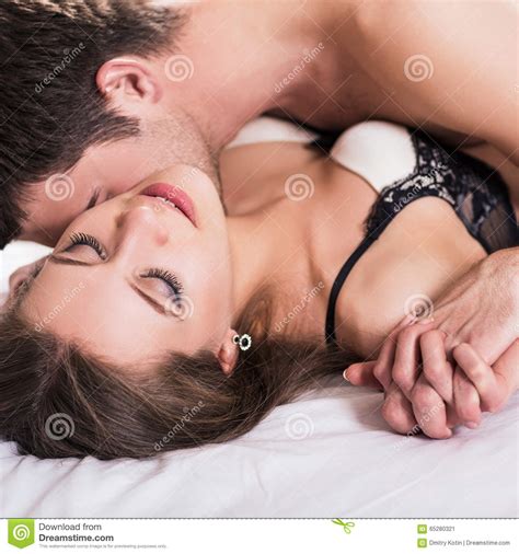 Young Romantic Couple Hugging And Kissing Stock Image