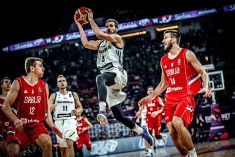 Young goran dragic dunking on a tree goal while eating in slovenia. Goran Dragic Slovenia EuroBasket