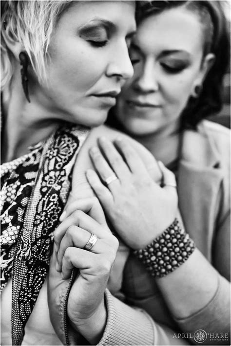 B W Romantic Photo Of A Close Up Of The Engagement Rings On A Lesbian Couple S Fingers During