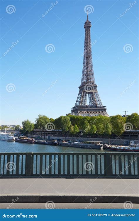 Eiffel Tower And Empty Sidewalk Bridge On Seine River Stock Image