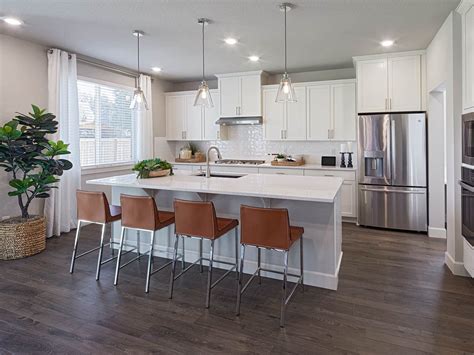 Plenty of room to entertain can be. The Kingwood kitchen is complete with a working island and ...