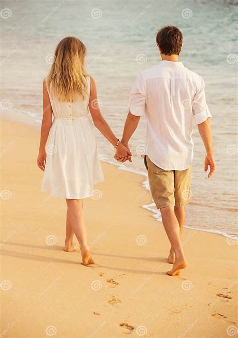 Young Couple In Love On The Beach Sunset Stock Image Image Of Hand