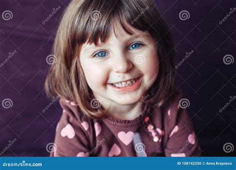 Girl With Large Blue Eyes Looking In Camera Stock Photo Image Of