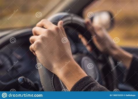 Driver S Hands On Steering Wheel Inside Of A Car Stock Image Image Of