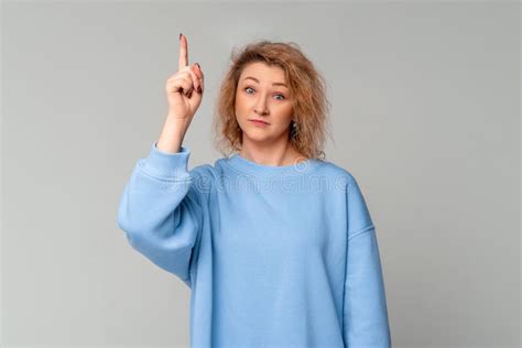 Eureka Portrait Of Middle Age Woman With Curly Blonde Hair Pointing Finger Up With Genius Idea