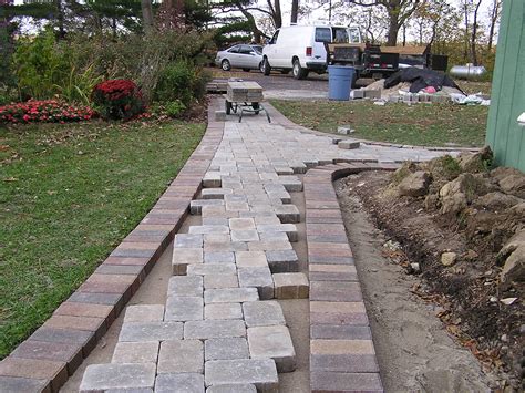 A house's front walkway gives you the first impression about it. A Paver Walkway - Fros Carpentry