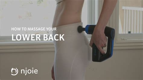 How To Massage Your Lower Back With A Percussion Massage Gun Youtube