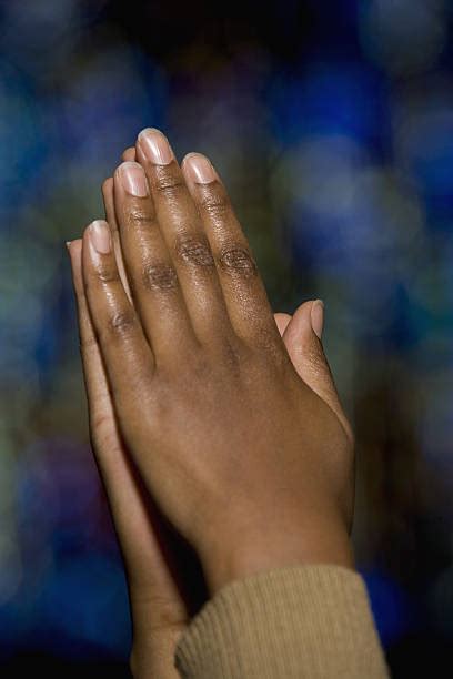 Black Woman Praying Hands Stock Photos Pictures And Royalty Free Images