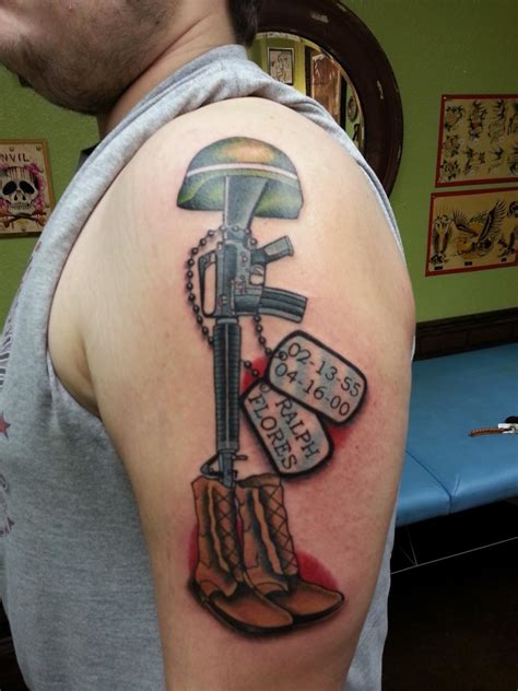 Gun tattoo with a gray ink design on the lower arm shows their foxy look. Rip Tattoos Designs, Ideas and Meaning | Tattoos For You