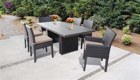 Outdoor dining tables gift you another zone for entertaining. Barbados Rectangular Outdoor Patio Dining Table With 4 ...