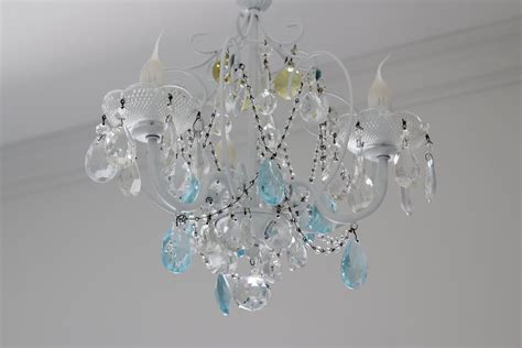 Crystals decorate the ceiling in a very aesthetic way. Ceiling fan chandelier kit - 10 facts to know before ...